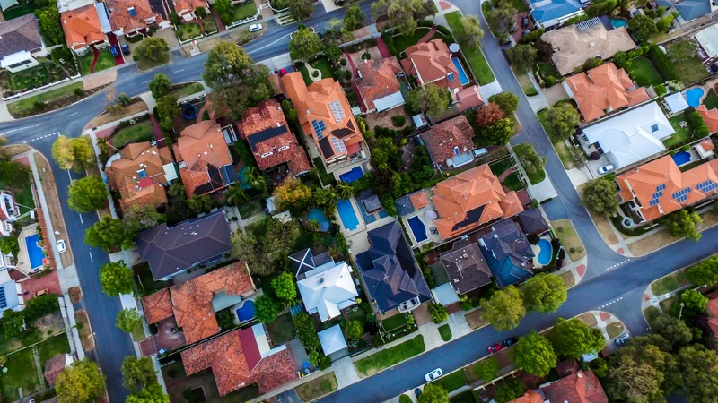 An aerial view of suburban rooftops